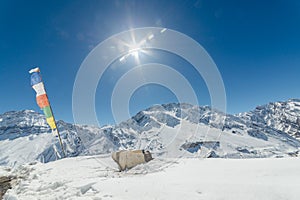 Winter in himalayas - Sun star burst in mountains