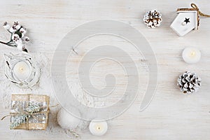 Winter holiday background on bleached wooden texture board