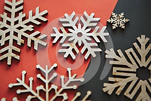 Winter holiday background with handmade wooden elements in close up