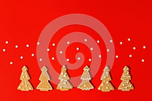 Winter Holiday banner set of gingerbread on bright red background - Number Happy New Year 2022, xmas tree with sprinkles, Merry