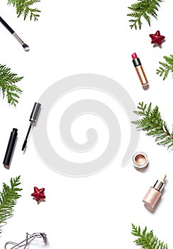Winter holiday beauty or cosmetic concept frame on the white background. Shopping make up for Christmas or New Year celebration.