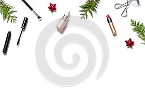 Winter holiday beauty or cosmetic concept frame on the white background. Shopping make up for Christmas or New Year celebration.