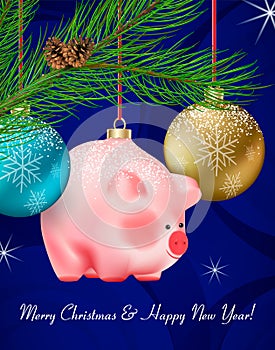 Winter holiday decor. Set of transparent Christmas blue and golden Baubles and cute piggy toy on ribbons on pine branch