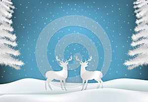 Winter holiday deer with snow and blue sky Christmas season