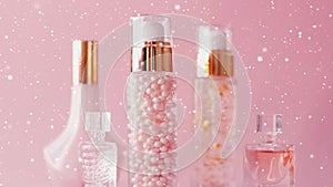 Winter holidays beauty product sale, make-up and cosmetics product promotion on pink background with snow and glitter