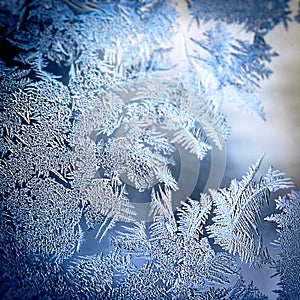 Winter Holidays Season Fantasy World Concept: Colourful Macro Image Of A Frosty Window Glass Natural Ice Patterns With Copy Space