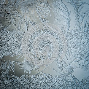 Winter Holidays Season Fantasy World Concept: Macro Image Of A Frosty Window Glass Natural Ice Patterns With Copy Space.