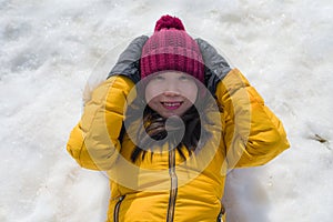 Winter holidays in the snow - lifestyle portrait of young happy and beautiful Asian Chinese girl enjoying playful at frozen lake