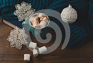 Winter home background - cup of hot cocoa Christmas ball and s