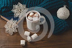 Winter home background - cup of hot cocoa Christmas ball and s