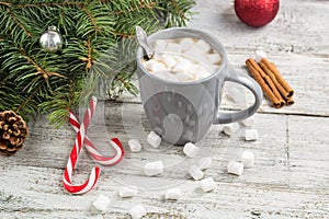 Winter hot drink. Christmas hot chocolate or cocoa with marshmallow on white with christmas decorations
