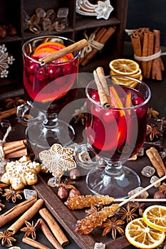 Winter hot drink with spices and tasty cookies