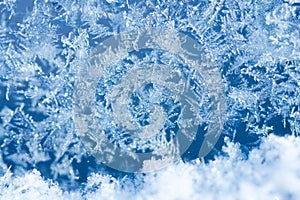 Winter ice frost, frozen background. frosted window glass texture. Cold cool icicles background. Winter wonderland scene.