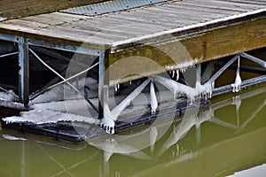 Winter Ice Hanging from Pier in Racine Wisconsin Harbor