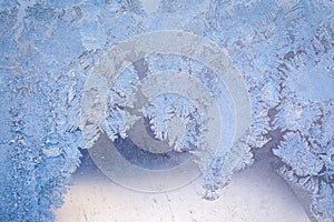 Winter ice pattern on the frozen window.