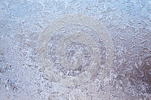 Winter ice pattern on the frozen window.