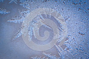 Winter ice pattern on the frozen window.