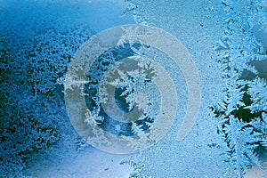 Winter ice pattern on the frozen window.