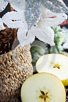 Winter Inspiration: Flowers, halved apples and crocheted vase