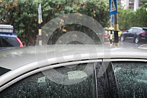 Winter in Israel: Downpour, Heavy rain floods cars and road, raindrops on metal and glass