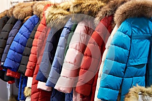 Winter jackets on a hanger in store