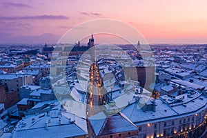 Winter in Krakow Poland old Town aerial view. Florianska walking street leads to Rynek Glowny photo