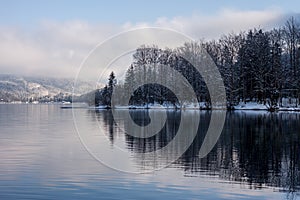 Winter lake landscape with reflactions