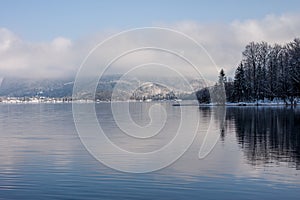 Winter lake landscape with reflactions