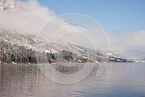 Winter lake landscape with reflactions