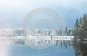 Winter lake landscape with reflactions