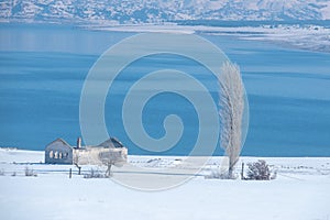 Winter Landcape with lake and village
