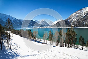 Winter landscape with beautiful mountain lake in the Alps