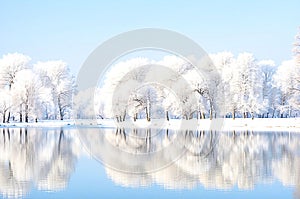 Winter landscape with beautiful reflection in the water