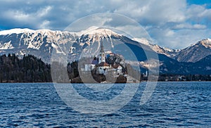 Winter landscape on Bled lake. Slovenija most famous landmark. Tourist attraction. Scenic landscape, romantic place