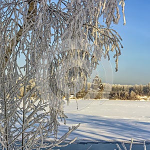 Winter landscape with boor, frost and snow photo