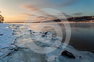 Winter landscape, dawn over the river