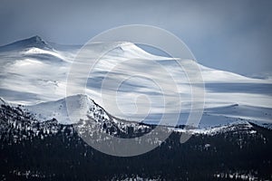 Winter landscape with dramatic snowy mountains