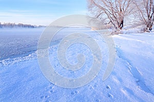 Winter landscape in the early morning overlooking the banks of the Volga River.