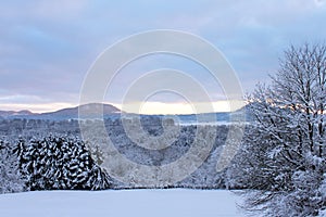 Winter landscape, forest and mountains in the snow