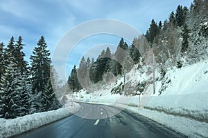 Winter landscape Forest road and trees covered with snow