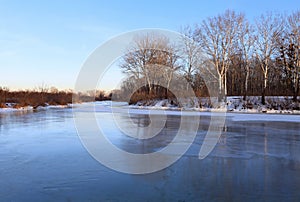 Winter landscape with frozen river