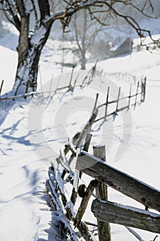 Winter landscape in Fundata village from Rucar Bran pass in Romania at the bottom of Bucegi Mountains