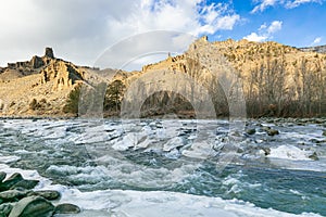 Ice packed riverbanks of the north fork Shoshone River Wyoming photo