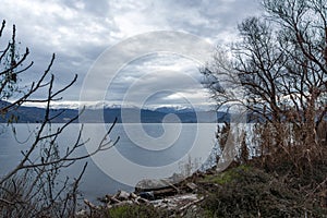 Winter Landscape of Lake Pamvotida and Pindus mountain from city of Ioannina, Epirus, Greece