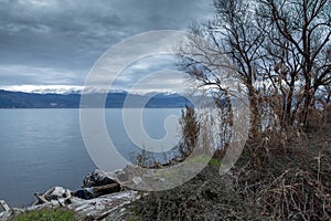 Winter Landscape of Lake Pamvotida and Pindus mountain from city of Ioannina, Epirus, Greece