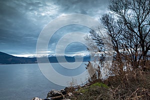 Winter Landscape of Lake Pamvotida and Pindus mountain from city of Ioannina, Epirus, Greece