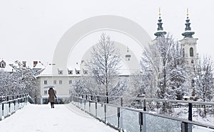 Winter landscape with Mariahilfer church in the background, in the city center of Graz, Steiermark region, Austria, in a beautiful