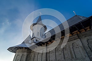 Sunrise on Piatra Fantanele monastery in winter time