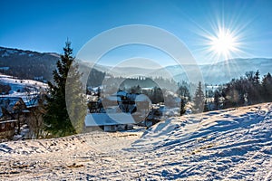 Winter landscape in mountainous rural area