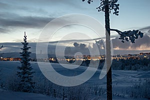 Winter landscape at night in Kiruna Lapland Sweden at night. Photographed 9 February 2024.